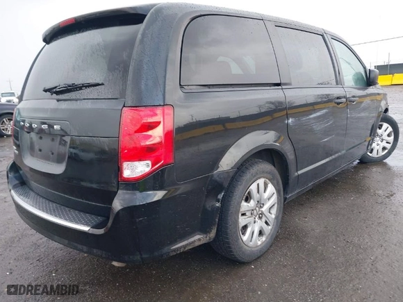 2019 Dodge Grand Caravan SE with VIN 2C4RDGBG7KR807428, listed as a IAAI auction lot 41538030 with 50,980 mi miles. Bid and sale history available at carsss.com. Image 4.