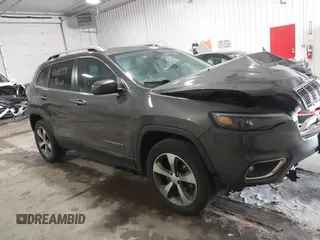 2019 Jeep Cherokee Limited z VIN 1C4PJMDX2KD467412, wystawiony jako IAAI lot #42087391 z przebiegiem 106 168 mil mil oraz . Historia ofert i sprzedaży dostępna na DreamBid. Obrazek 1.