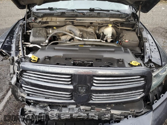 2013 Ram 1500 Sport with VIN 1C6RR7HT7DS676712, listed as a Copart auction lot 77384224 with 147,928 mi miles and Salvage title. Bid and sale history available at DreamBid. Image 11.