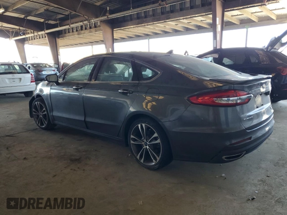 2020 Ford Fusion Titanium with VIN 3FA6P0K92LR115615, listed as a Copart auction lot 60471975 with 73,069 mi miles and Salvage title. Bid and sale history available at DreamBid. Image 2.
