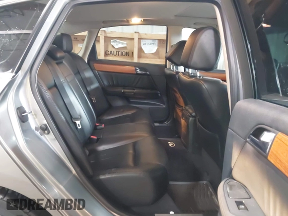 2006 Infiniti M z VIN JNKAY01E76M109160, wystawiony jako IAAI lot #41252984 z przebiegiem 134 744 mil mil oraz . Historia ofert i sprzedaży dostępna na DreamBid. Obrazek 8.