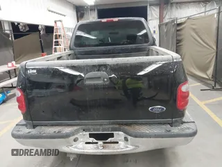 2001 Ford F-150 XL with VIN 1FTRX07W61KF82074, listed as a IAAI auction lot 41444721 with 125,494 mi miles. Bid and sale history available at carsss.com. Image 17.