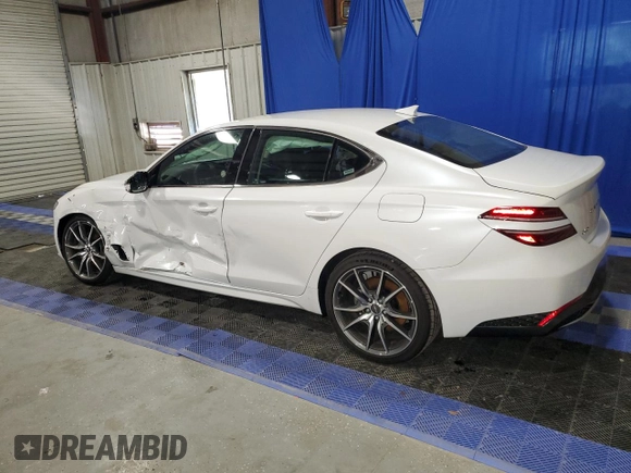 2023 Genesis G70 2.0T with VIN KMTG34TAXPU131832, listed as a Copart auction lot 44111124 with 3,203 mi miles and Non Repairable. Bid and sale history available at DreamBid. Image 2.