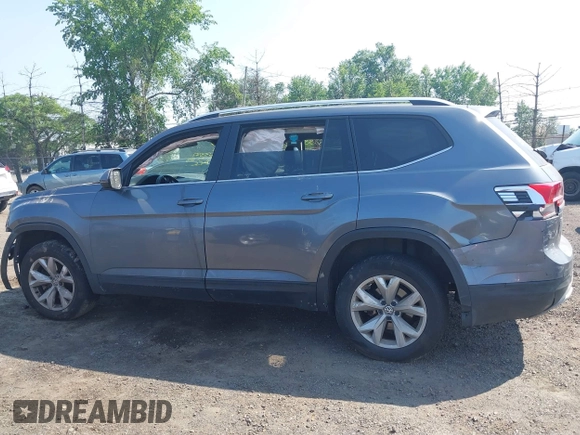 2018 Volkswagen Atlas SE with VIN 1V2KR2CA3JC504717, listed as a IAAI auction lot 42414174 with 105,909 mi miles and . Bid and sale history available at DreamBid. Image 14.