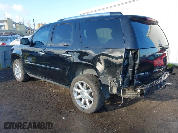 2013 GMC Yukon Denali with VIN 1GKS2EEF9DR208591, listed as a IAAI auction lot 41802138 with 160,371 mi miles. Bid and sale history available at carsss.com. Image 3.