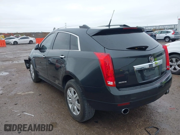 2014 Cadillac SRX Luxury Collection with VIN 3GYFNBE31ES591962, listed as a IAAI auction lot 41948735 with 97,523 mi miles and . Bid and sale history available at carsss.com. Image 3.