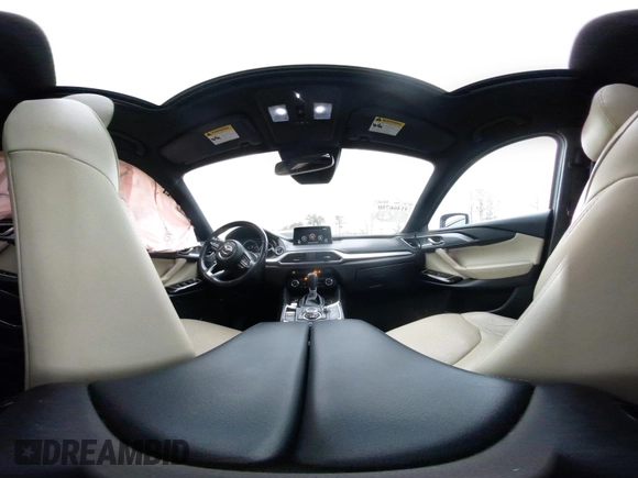 2016 Mazda CX-9 Grand Touring with VIN JM3TCADY0G0113779, listed as a IAAI auction lot 41466750 with 58,035 mi miles and . Bid and sale history available at DreamBid. Image 18.