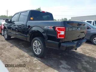 2018 Ford F-150 XL with VIN 1FTEW1EP1JKD05142, listed as a IAAI auction lot 42473177 with 99,079 mi miles and . Bid and sale history available at DreamBid. Image 3.