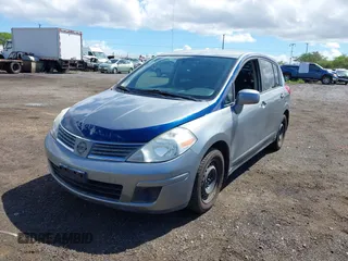 2009 Nissan Versa 1.8 SL with VIN 3N1BC13E79L388487, listed as a IAAI auction lot 42078888 with 44,488 mi miles. Bid and sale history available at carsss.com. Image 6.