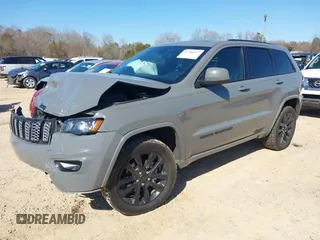 2019 Jeep Grand Cherokee Laredo E with VIN 1C4RJFAG2KC855108, listed as a IAAI auction lot 41780277 with 81,283 mi miles and . Bid and sale history available at DreamBid. Image 2.