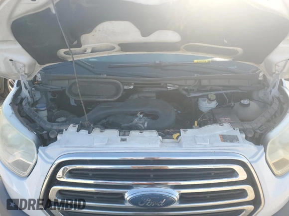 2015 Ford Transit Cargo with VIN 1FTNR1ZM4FKA33992, listed as a Copart auction lot 74308214 with 115,095 mi miles and Salvage Title. Bid and sale history available at DreamBid. Image 12.