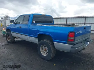2001 Dodge Ram 1500 with VIN 3B7HF13Z31G207397, listed as a IAAI auction lot 41977625 with 166,166 mi miles. Bid and sale history available at carsss.com. Image 3.