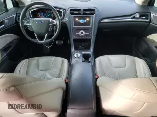 2017 Ford Fusion Titanium z VIN 3FA6P0SU0HR290201, wystawiony jako Copart lot #60106095 z przebiegiem 98 086 mil mil oraz Szkoda całkowita • Salvage title. Historia ofert i sprzedaży dostępna na DreamBid. Obrazek 8.