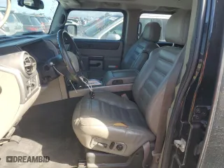 2003 Hummer H2 with VIN 5GRGN23U33H114427, listed as a Copart auction lot 76528834 with 133,571 mi miles and Salvage Title. Bid and sale history available at carsss.com. Image 7.