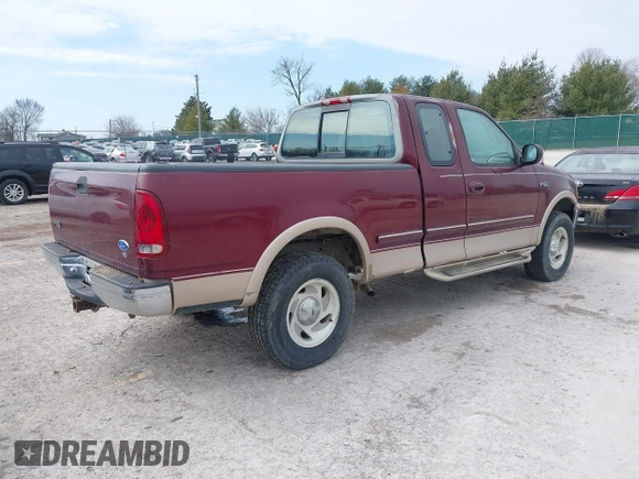 1997 Ford F-150 XL with VIN 1FTEX18L5VNC45344, listed as a IAAI auction lot 41690852 with 205,766 mi miles. Bid and sale history available at carsss.com. Image 4.
