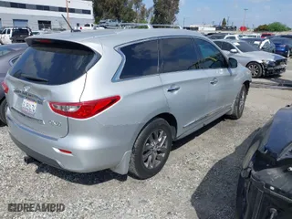 2015 Infiniti QX60 with VIN 5N1AL0MN1FC543104, listed as a IAAI auction lot 41870709 with 77,361 mi miles. Bid and sale history available at carsss.com. Image 4.