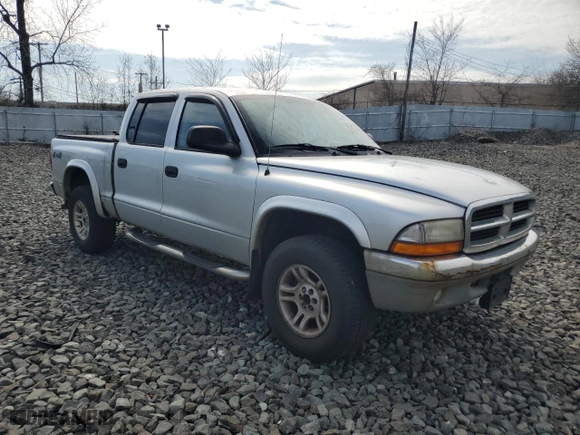 2004 Dodge Dakota SLT with VIN 1D7HG48NX4S677465, listed as a Copart auction lot 51044735 with 196,854 mi miles and Clean Title. Bid and sale history available at carsss.com. Image 4.
