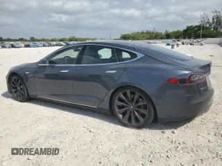 2014 Tesla Model S P85D with VIN 5YJSA1H28EFP62793, listed as a Copart auction lot 52902495 with Not Provided miles and Salvage Title. Bid and sale history available at DreamBid. Image 2.