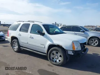 2010 GMC Yukon SLT with VIN 1GKUKCE09AR158621, listed as a IAAI auction lot 41517065 with 265,284 mi miles. Bid and sale history available at carsss.com. Image 1.