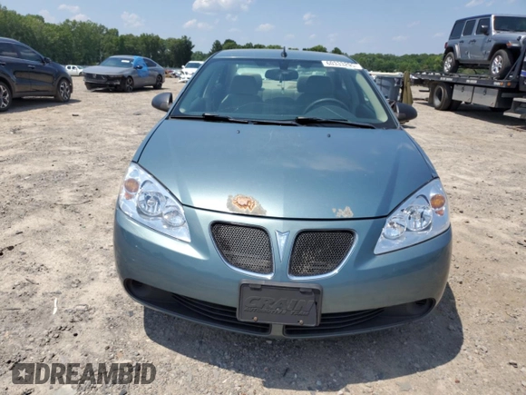 2009 Pontiac G6 1SA with VIN 1G2ZG57B294112753, listed as a Copart auction lot 60333295 with 172,422 mi miles and Salvage title. Bid and sale history available at DreamBid. Image 5.