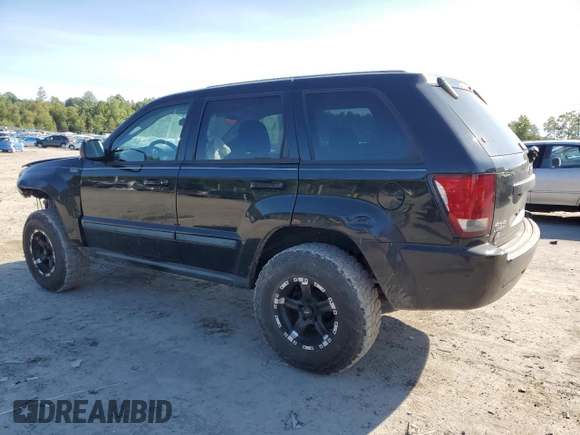 2008 Jeep Grand Cherokee Laredo with VIN 1J8GR48KX8C102393, listed as a Copart auction lot 69696834 with 173,049 mi miles and Salvage Title. Bid and sale history available at carsss.com. Image 2.