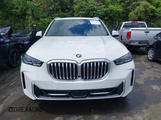 2024 BMW X5 xDrive40i z VIN 5UX23EU05R9S29952, wystawiony jako IAAI lot #42177371 z przebiegiem 26 832 mil mil oraz . Historia ofert i sprzedaży dostępna na DreamBid. Obrazek 12.