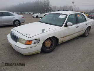 2001 Mercury Grand Marquis LS with VIN 2MEFM75W81X678887, listed as a IAAI auction lot 41254252 with 113,742 mi miles and . Bid and sale history available at DreamBid. Image 2.