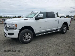 2023 Ram 2500 Laramie with VIN 3C6UR5FJ1PG634158, listed as a Copart auction lot 57164505 with 18,279 mi miles and Salvage title. Bid and sale history available at DreamBid. Image 1.