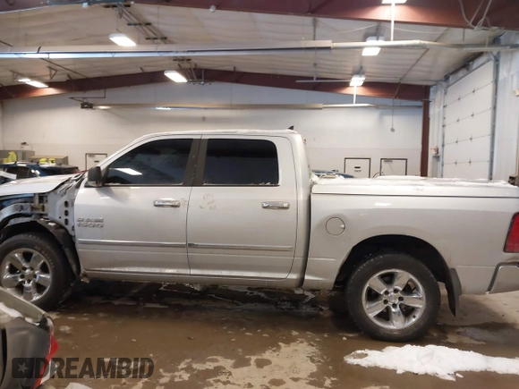 2015 Ram 1500 Big Horn with VIN 1C6RR7LG7FS612067, listed as a IAAI auction lot 41596673 with 200,743 mi miles. Bid and sale history available at carsss.com. Image 14.