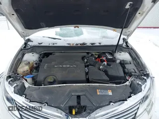 2015 Lincoln MKZ с VIN 3LN6L2JK2FR603436, выставлен на аукционе IAAI как лот 41598218 с пробегом 107 059 миль миль и . История ставок и продаж доступна на DreamBid. Изображение 10.