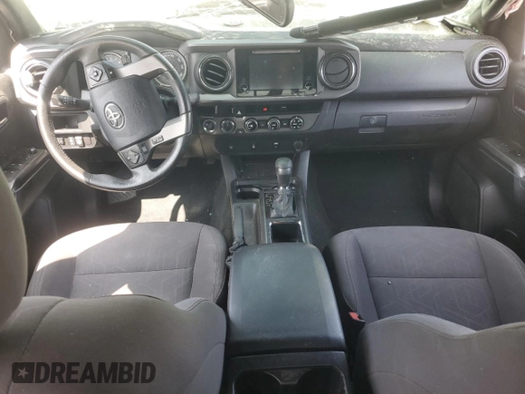 2017 Toyota Tacoma SR5 with VIN 3TMCZ5AN7HM065026, listed as a Copart auction lot 60438365 with 122,329 mi miles and Salvage title. Bid and sale history available at DreamBid. Image 8.
