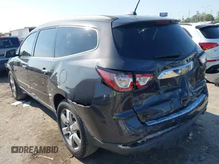 2016 Chevrolet Traverse LTZ z VIN 1GNKRJKD1GJ301277, wystawiony jako IAAI lot #41884629 z przebiegiem 106 338 mil mil oraz . Historia ofert i sprzedaży dostępna na DreamBid. Obrazek 3.