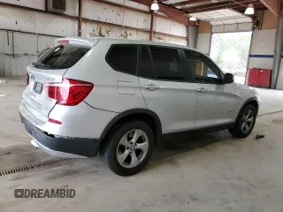 2012 BMW X3 28i with VIN 5UXWX5C56CL721970, listed as a Copart auction lot 51210875 with 125,661 mi miles and Salvage Title. Bid and sale history available at DreamBid. Image 3.