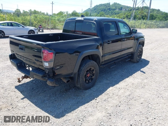 2019 Toyota Tacoma SR with VIN 5TFCZ5AN4KX208354, listed as a IAAI auction lot 42771410 with 77,509 mi miles and . Bid and sale history available at DreamBid. Image 4.