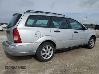 2005 Ford Focus SE with VIN 1FAFP36N75W299099, listed as a Copart auction lot 51410635 with 160,652 mi miles and Salvage Title. Bid and sale history available at carsss.com. Image 3.