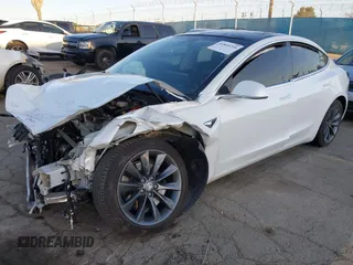 2020 Tesla Model 3 Performance with VIN 5YJ3E1EC1LF602516, listed as a IAAI auction lot 41841216 with 28,967 mi miles and . Bid and sale history available at DreamBid. Image 2.