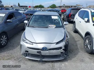 2022 Toyota Prius L Eco with VIN JTDKAMFU0N3181467, listed as a IAAI auction lot 41802679 with 121,749 mi miles. Bid and sale history available at carsss.com. Image 12.