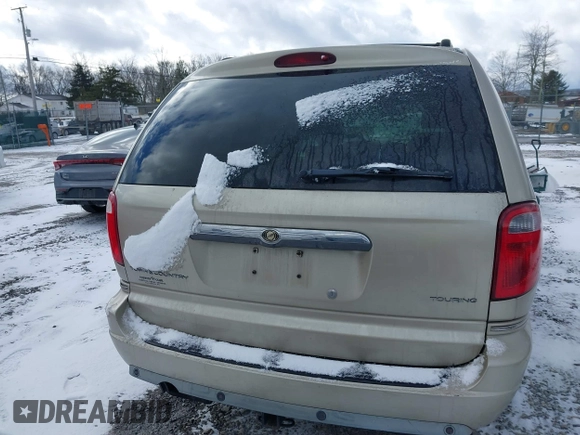 2006 Chrysler Town & Country LWB Touring with VIN 2A8GP54L86R887561, listed as a IAAI auction lot 41235389 with 124,554 mi miles. Bid and sale history available at carsss.com. Image 16.