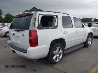 2007 Chevrolet Tahoe LS with VIN 1GNFC13J97R281157, listed as a IAAI auction lot 42167329 with Not provided miles and . Bid and sale history available at DreamBid. Image 4.