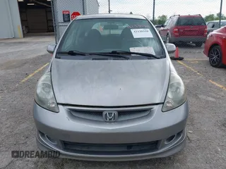 2007 Honda Fit Sport with VIN JHMGD37697S040265, listed as a IAAI auction lot 42130310 with 127,906 mi miles. Bid and sale history available at carsss.com. Image 6.