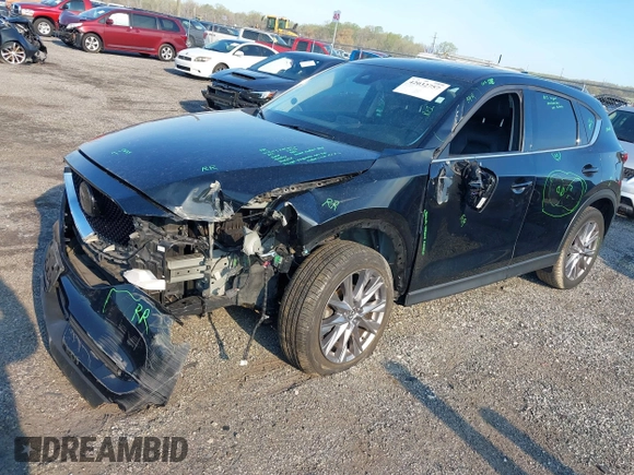 2019 Mazda CX-5 Grand Touring with VIN JM3KFBDM7K0525650, listed as a IAAI auction lot 42032757 with 65,530 mi miles and . Bid and sale history available at DreamBid. Image 18.