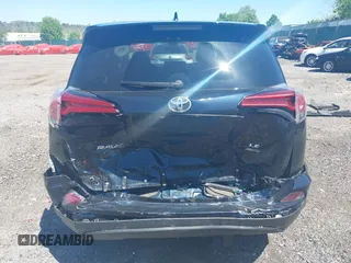 2017 Toyota RAV4 LE with VIN JTMBFREV8HJ168975, listed as a IAAI auction lot 42139354 with 91,394 mi miles and . Bid and sale history available at DreamBid. Image 6.