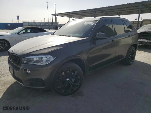 2014 BMW X5 sDrive35i with VIN 5UXKR2C56E0H33129, listed as a Copart auction lot 88819045 with 129,085 mi miles and Salvage Title. Bid and sale history available at carsss.com. Image 1.