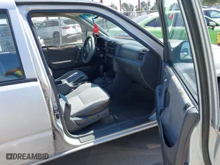1998 Isuzu Rodeo S with VIN 4S2CM58WXW4325350, listed as a IAAI auction lot 42084411 with 292,784 mi miles. Bid and sale history available at carsss.com. Image 5.