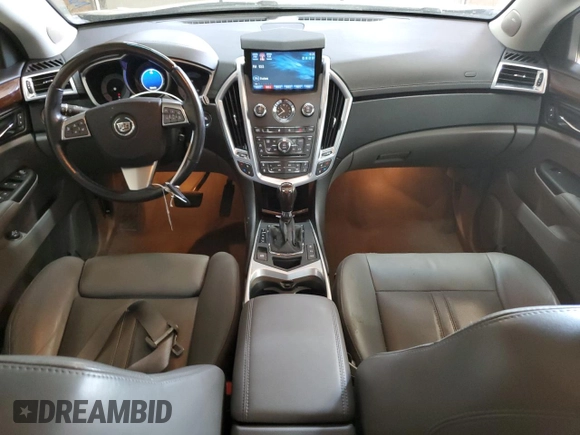 2012 Cadillac SRX Premium Collection with VIN 3GYFNFE33CS643354, listed as a Copart auction lot 61646135 with 131,177 mi miles and Clean title. Bid and sale history available at DreamBid. Image 8.