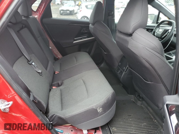 2024 Subaru Solterra Premium с VIN JTMABABAXRA061504, выставлен на аукционе Copart как лот 85550114 с пробегом 9 602 миль миль и Списание • Salvage title. История ставок и продаж доступна на DreamBid. Изображение 11.