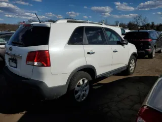2011 Kia Sorento LX with VIN 5XYKTDA25BG124284, listed as a Copart auction lot 50099955 with 220,800 mi miles and Clean Title. Bid and sale history available at carsss.com. Image 3.