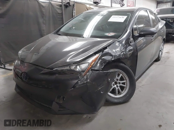 2018 Toyota Prius Two with VIN JTDKARFU6J3553871, listed as a IAAI auction lot 41577636 with 118,715 mi miles. Bid and sale history available at carsss.com. Image 17.