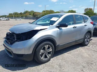 2019 Honda CR-V LX with VIN 2HKRW5H31KH411771, listed as a IAAI auction lot 42060193 with 175,036 mi miles and . Bid and sale history available at DreamBid. Image 2.