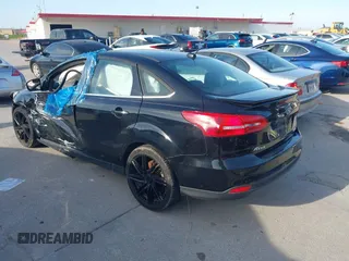 2016 Ford Focus Titanium with VIN 1FADP3J26GL335843, listed as a IAAI auction lot 42799795 with 167,506 mi miles and . Bid and sale history available at DreamBid. Image 3.